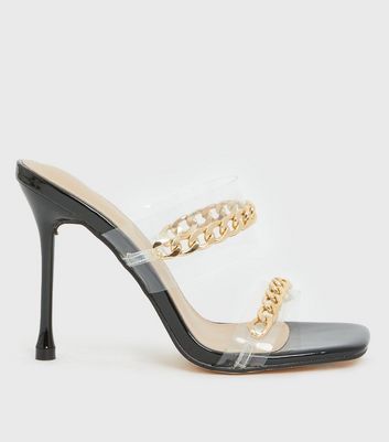 black and clear mules