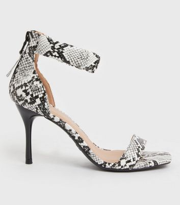 white snakeskin heels