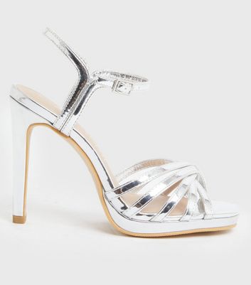 silver metallic platform heels