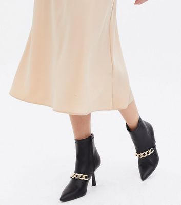 low heeled pearl chain ankle boots