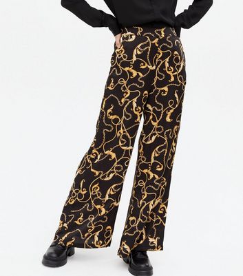 Click to view product details and reviews for Black Chain Satin Wide Leg Trousers New Look.
