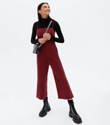 Cropped jumpsuit hot sale with boots