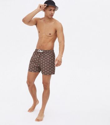Click to view product details and reviews for Mens Burgundy Tile Print Swim Shorts New Look.