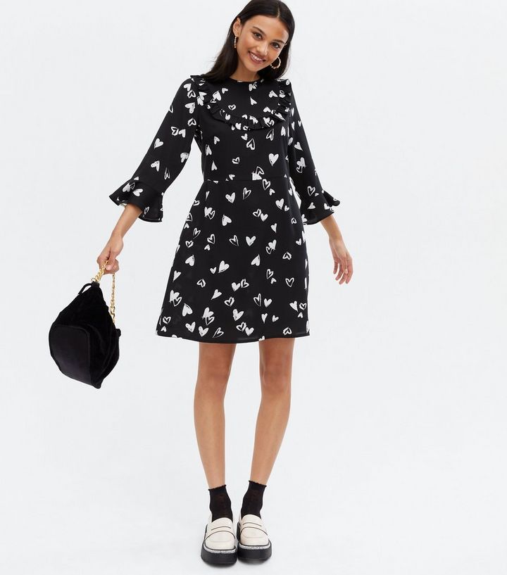 In The Style x Lorna Luxe mini smock dress with exaggerated sleeves in black