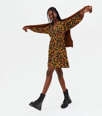 Click to view product details and reviews for Brown Daisy Ruffle V Neck Mini Dress New Look.