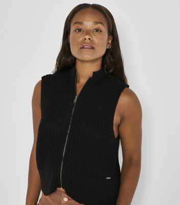 Click to view product details and reviews for Noisy May Black Knit High Neck Zip Sleeveless Vest New Look.