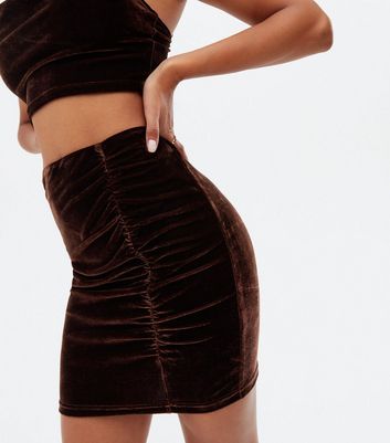 Click to view product details and reviews for Pink Vanilla Dark Brown Velvet Ruched Mini Skirt New Look.