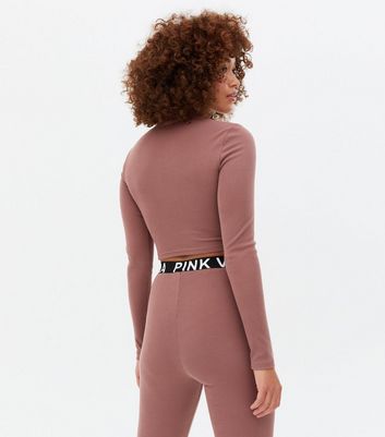 Click to view product details and reviews for Pink Vanilla Mid Pink Logo Zip High Neck Crop Top New Look.