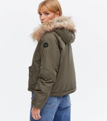 green parka with faux fur hood