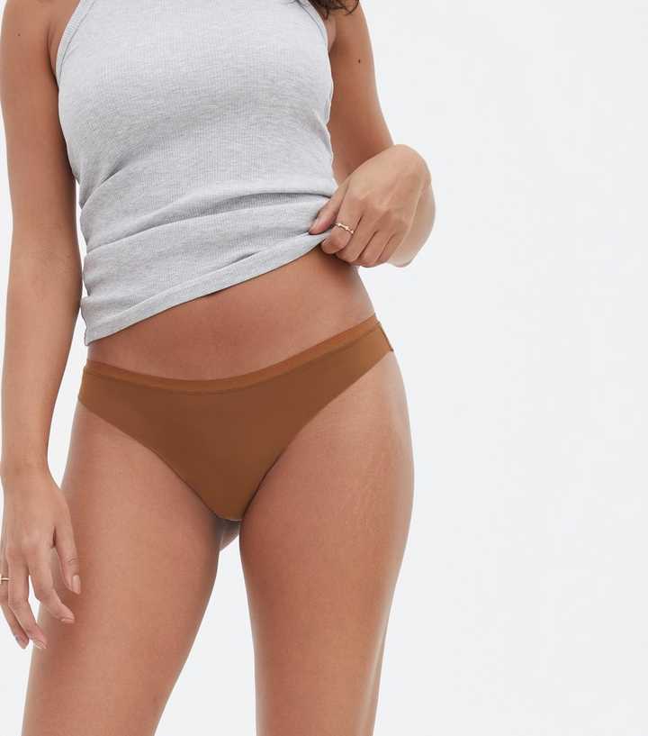 https://media2.newlookassets.com/i/newlook/810032724/womens/clothing/lingerie/nude-cinnamon-lace-back-seamless-thong.jpg?strip=true&qlt=50&w=720