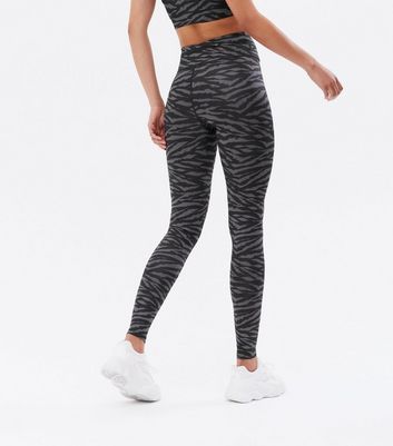 Click to view product details and reviews for Tall Black Zebra Print High Waist Sports Leggings New Look.