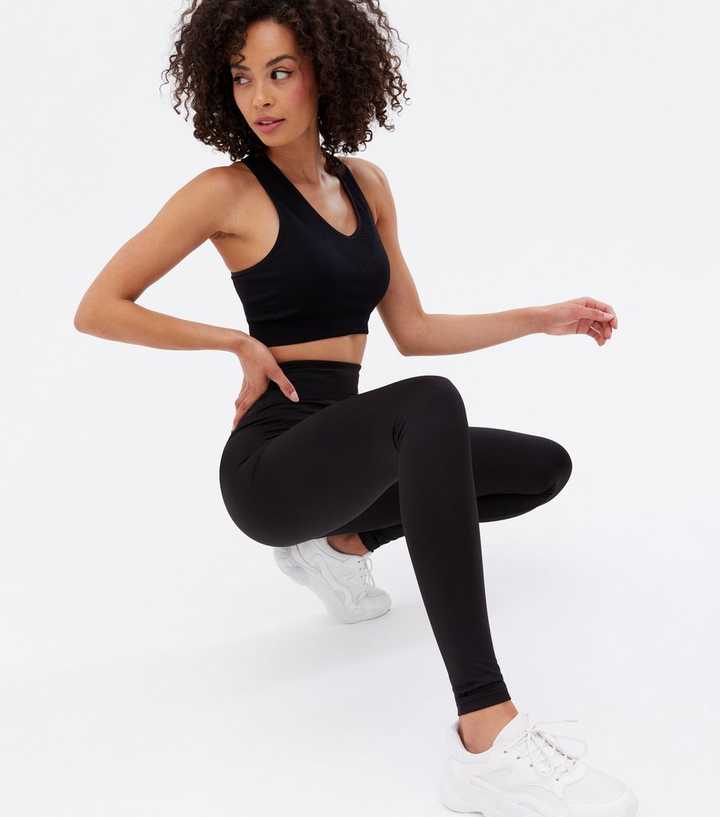 https://media2.newlookassets.com/i/newlook/810205201/womens/clothing/leggings/tall-black-zip-back-sports-leggings.jpg?strip=true&qlt=50&w=720