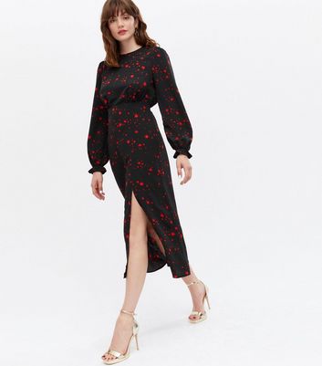 black long sleeve dress with stars