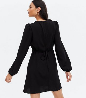 black long sleeve tea dress