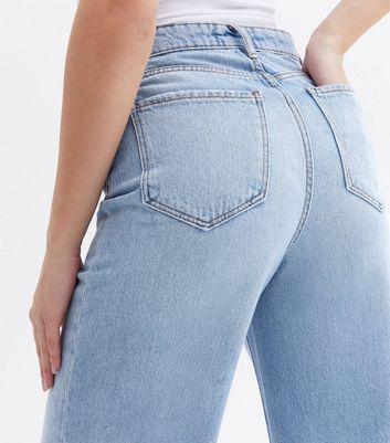 Click to view product details and reviews for Pale Blue High Waist Adalae Wide Leg Jeans New Look.
