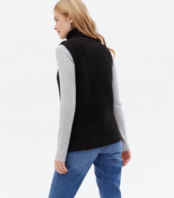 sleeveless black roll neck jumper