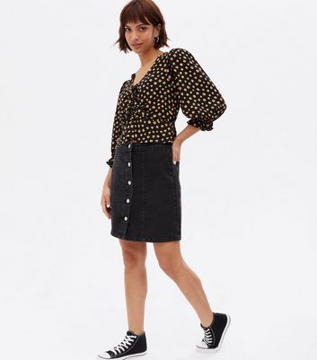 Click to view product details and reviews for Black Ditsy Floral Ruched Tie Front Blouse New Look.