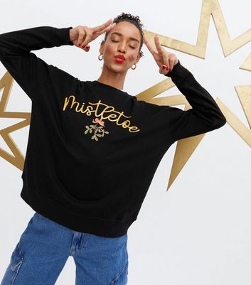 Click to view product details and reviews for Black Christmas Mistletoe Logo Sweatshirt New Look.