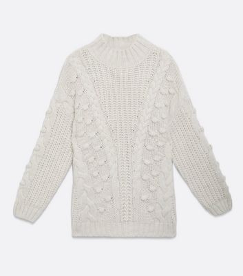 white bobble jumper