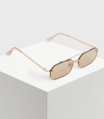 sunglasses with gold bar on top