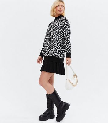 Click to view product details and reviews for Cameo Rose Black Knit Zebra Print Crew Neck Jumper New Look.