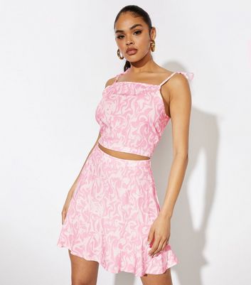 Click to view product details and reviews for Skinnydip Pink Marble Tiered Flippy Skirt New Look.