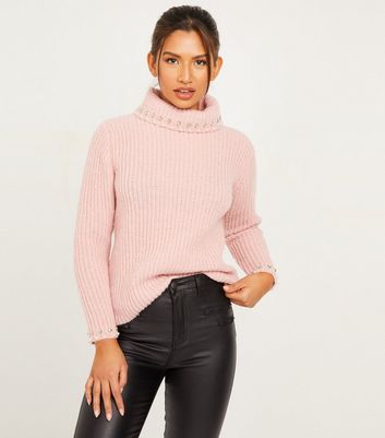 pink chunky roll neck jumper