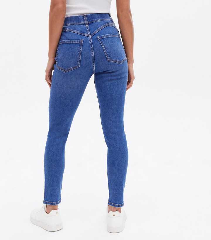 https://media2.newlookassets.com/i/newlook/813497246M3/womens/clothing/jeans/petite-bright-blue-mid-rise-lift-shape-emilee-jeggings.jpg?strip=true&qlt=50&w=720