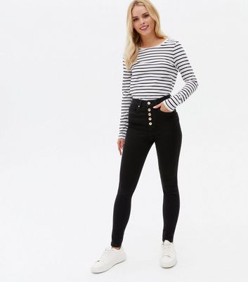 button skinny jeans