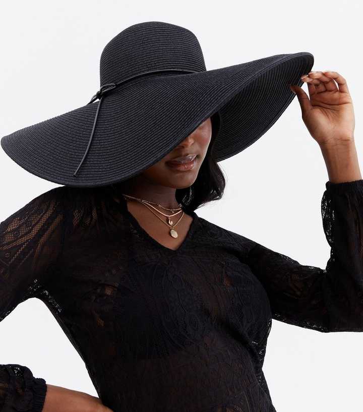 https://media2.newlookassets.com/i/newlook/813913401/womens/accessories/hats/black-oversized-floppy-hat.jpg?strip=true&qlt=50&w=720