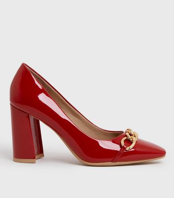 Red patent store block heels