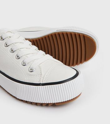 Click to view product details and reviews for White Canvas Tab Back Lace Up Trainers New Look.