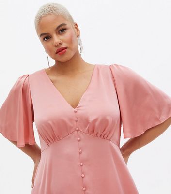 Click to view product details and reviews for Curves Pink Satin Flutter Sleeve Button Front Midi Dress New Look.