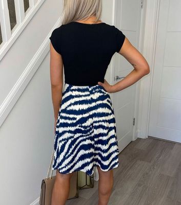 Click to view product details and reviews for Missfiga Blue Zebra Print Mini Skater Dress New Look.