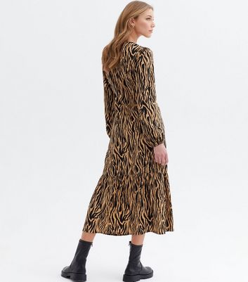 Click to view product details and reviews for Brown Zebra Print Tiered Midi Dress New Look.