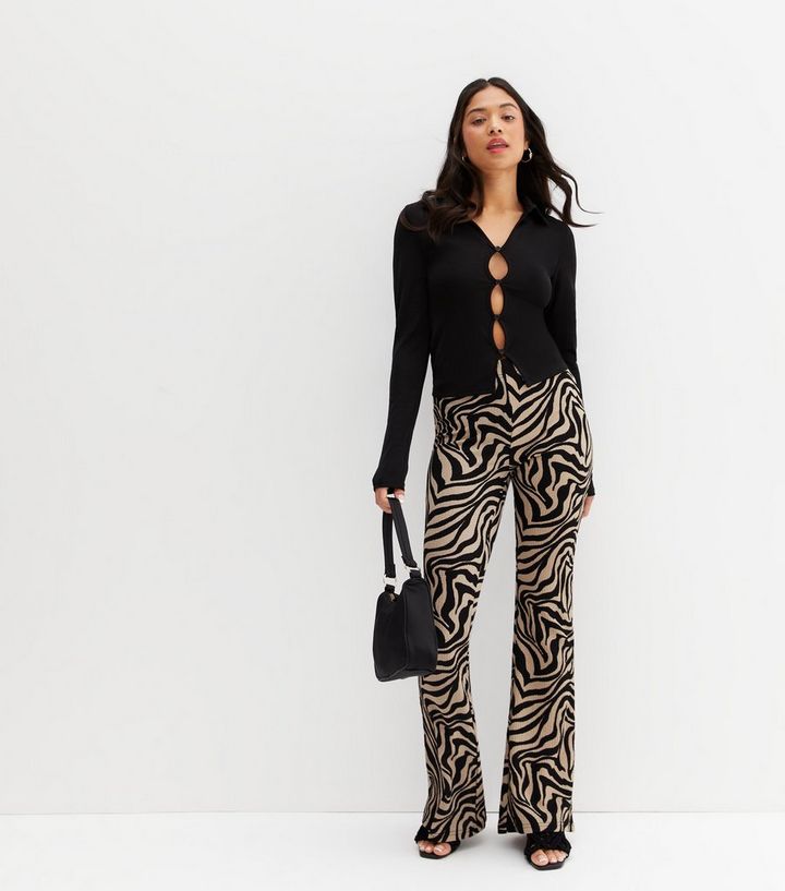 ONLY Petite Brown Zebra Print Flared Trousers | New Look