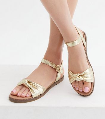 Gold flip flops new 2024 look