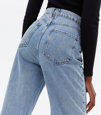 Click to view product details and reviews for Tall Blue Ripped High Waist Adalae Wide Leg Jeans New Look.