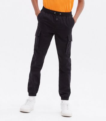 Loose Fit Cargo trousers - Black - Men | H&M IN