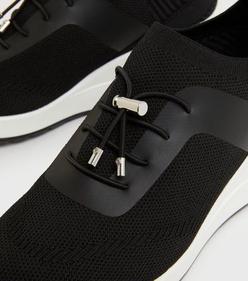 Click to view product details and reviews for Black Knit Toggle Wedge Trainers New Look Vegan.