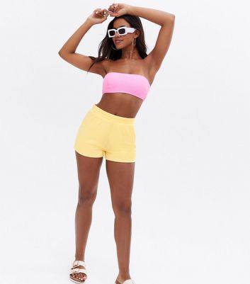 Click to view product details and reviews for Pale Yellow Towelling Beach Shorts New Look.