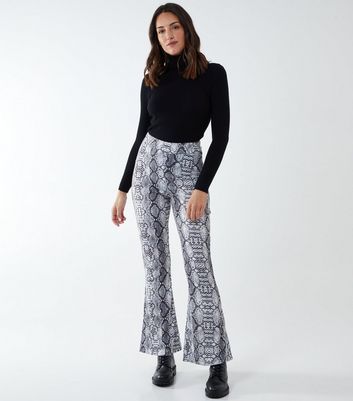 Flared snake hot sale print pants