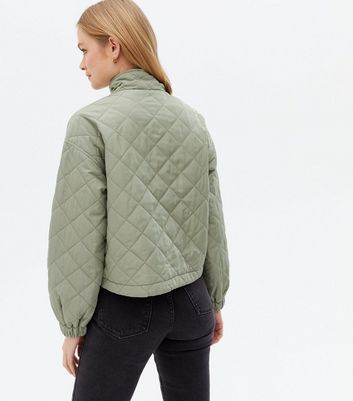 Click to view product details and reviews for Olive Quilted High Neck Crop Jacket New Look.