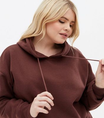 Click to view product details and reviews for Curves Dark Brown Pocket Front Oversized Hoodie New Look.