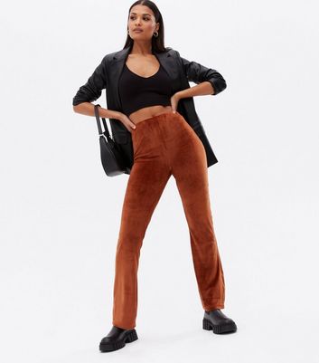 Click to view product details and reviews for Jdy Rust Ribbed Flared Trousers New Look.