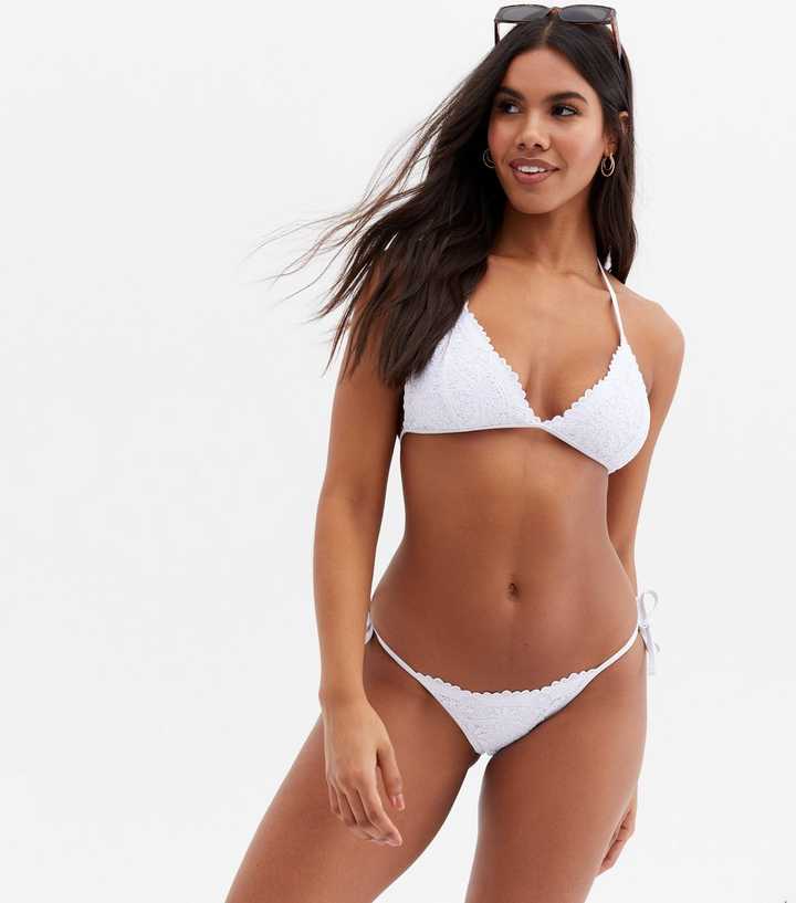 https://media2.newlookassets.com/i/newlook/815678410/womens/clothing/swimwear/white-broderie-tie-side-bikini-bottoms.jpg?strip=true&qlt=50&w=720
