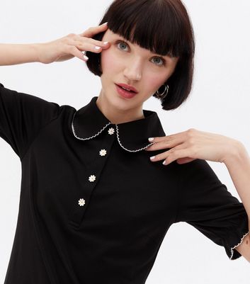 Click to view product details and reviews for Black Jersey Daisy Button Mini Polo Dress New Look.