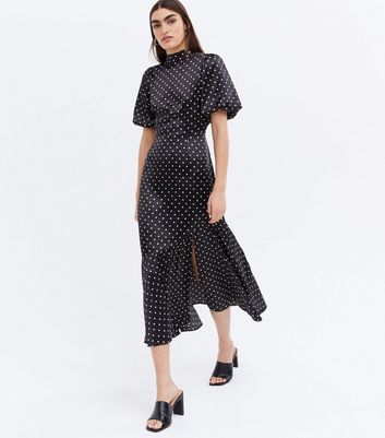 Click to view product details and reviews for Black Spot Satin High Neck Open Back Midi Dress New Look.