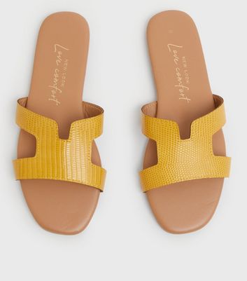 laton ugg slides