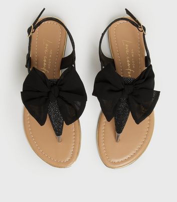 Click to view product details and reviews for Girls Black Glitter Bow Slingback Sandals New Look Vegan.